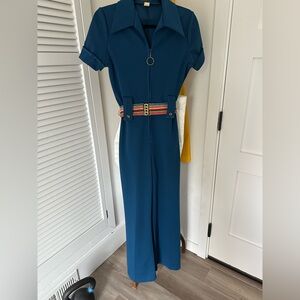 Women’s Vintage 1970’s Blue Knit Wid Leg Jumpsuit w/Rainbow elastic belt. Sz 9